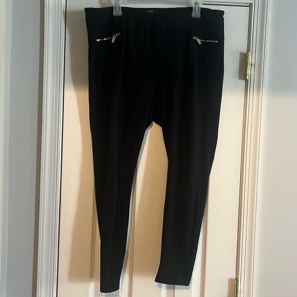 Black leggings with gold zippers